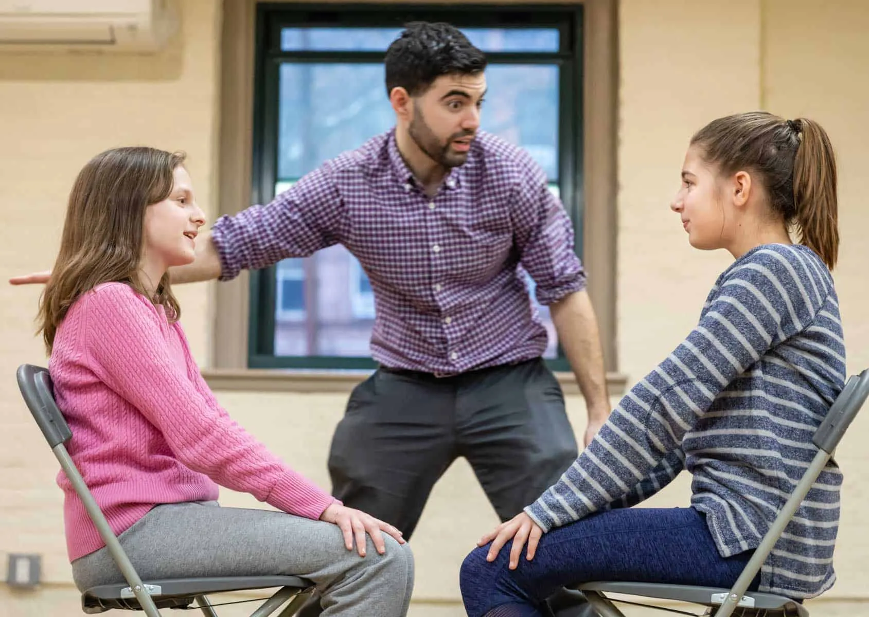 Danny Greenberg coaching young students in an acting class