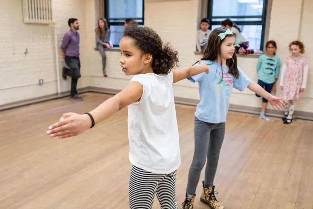 Students engaged in a movement class at The Danny Greenberg Studio